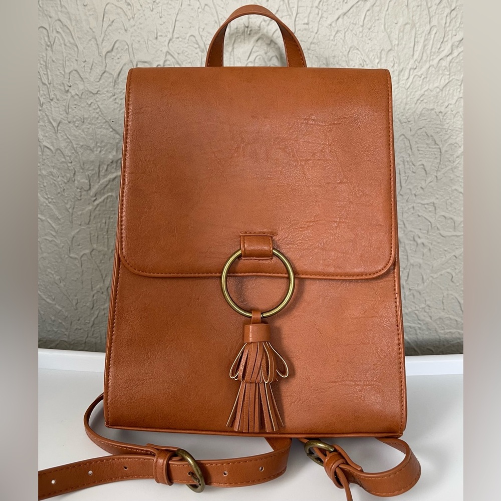 Universal Thread Flap Backpack with Tassel